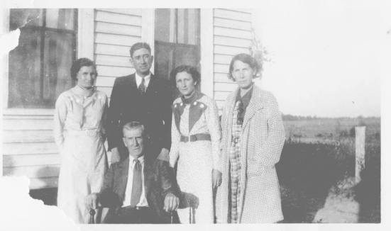 Pa Crowell and his four children.  My great, great grandmother, Ora, is on the left.