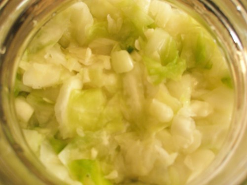 A view of the finished kraut, packed in a jar, from above